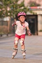 Young girl practicing inline skating, Beijing, China